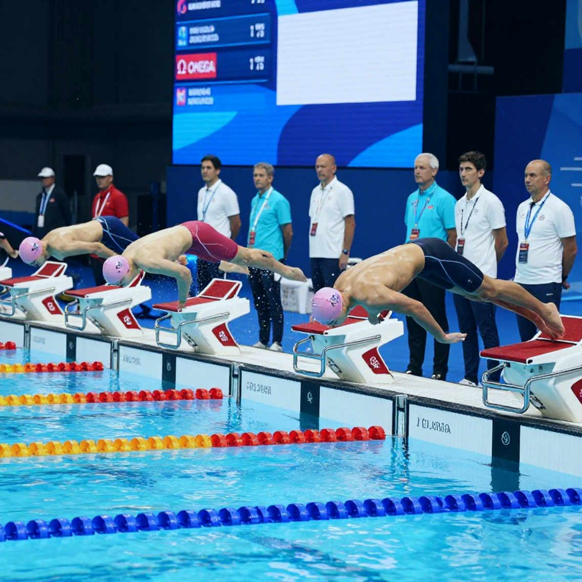 Nine Layers of Water: Dissecting Elite Swimming from Lane to Podium Nine Layers of Water: Dissecting Elite Swimming from Lane to Podium